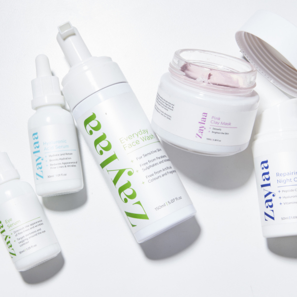 a collection of Zaylaa skincare products in various sized bottles on a white background.